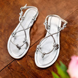 KIKUE Sandale brillante en cuir