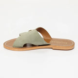 CONI mules en cuir kaki clair