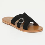 CONI mules en cuir