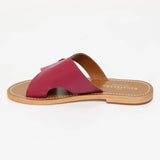 CONI mules en cuir prune