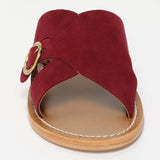 CONI mules en cuir grape