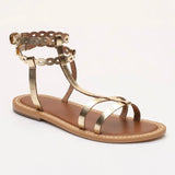 JESSAMINE sandales spartiate / lacet en cuir doré foncé
