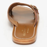 CONI mules en cuir caramel