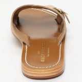 CONI mules en cuir beige clair