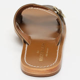 CONI mules en cuir kaki lézard