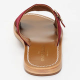 CONI mules en cuir grape