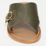 CONI mules en cuir kaki foncé