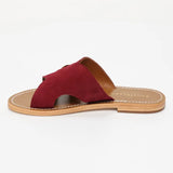 CONI mules en cuir grape