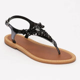 MYRIELA sandales entre-doigts en cuir noir