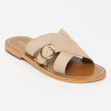 CONI mules en cuir beige clair