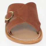 CONI mules en cuir caramel
